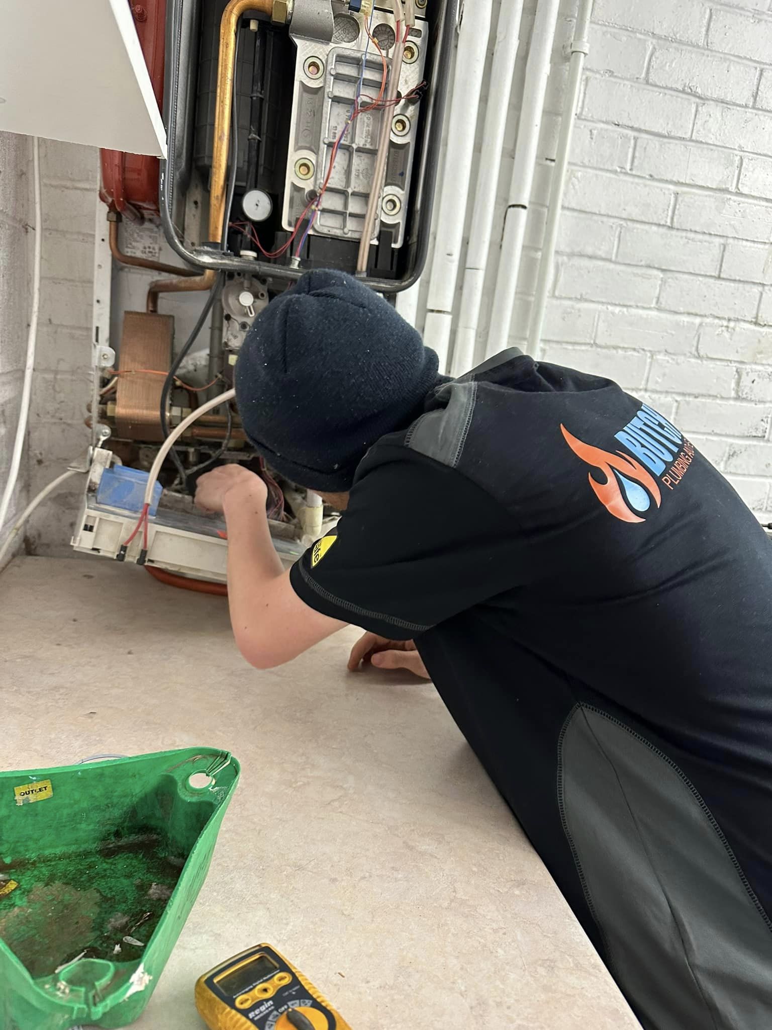 BUTCH’S engineer working on a boiler
